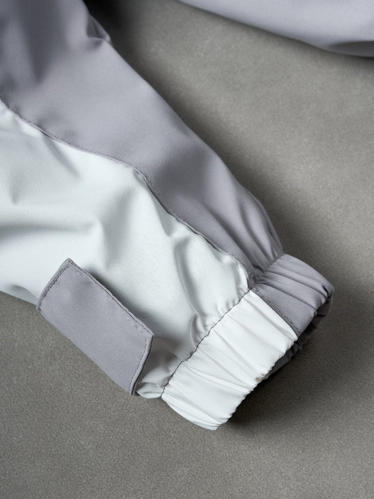 FluxGuard – Futuristic Urban Performance Windbreaker