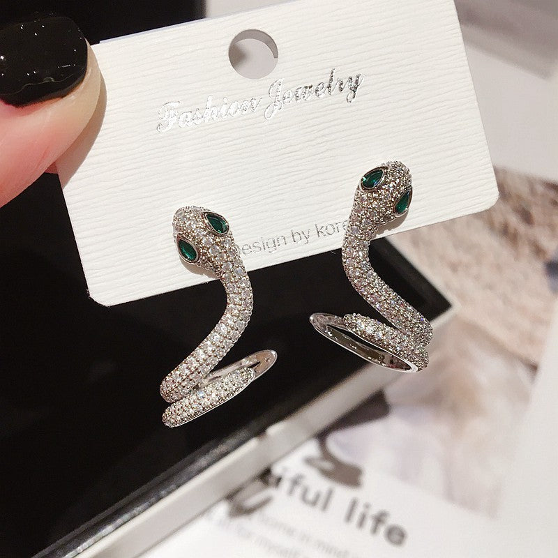 SerpentGlow – Sparkling Snake Statement Jewelry