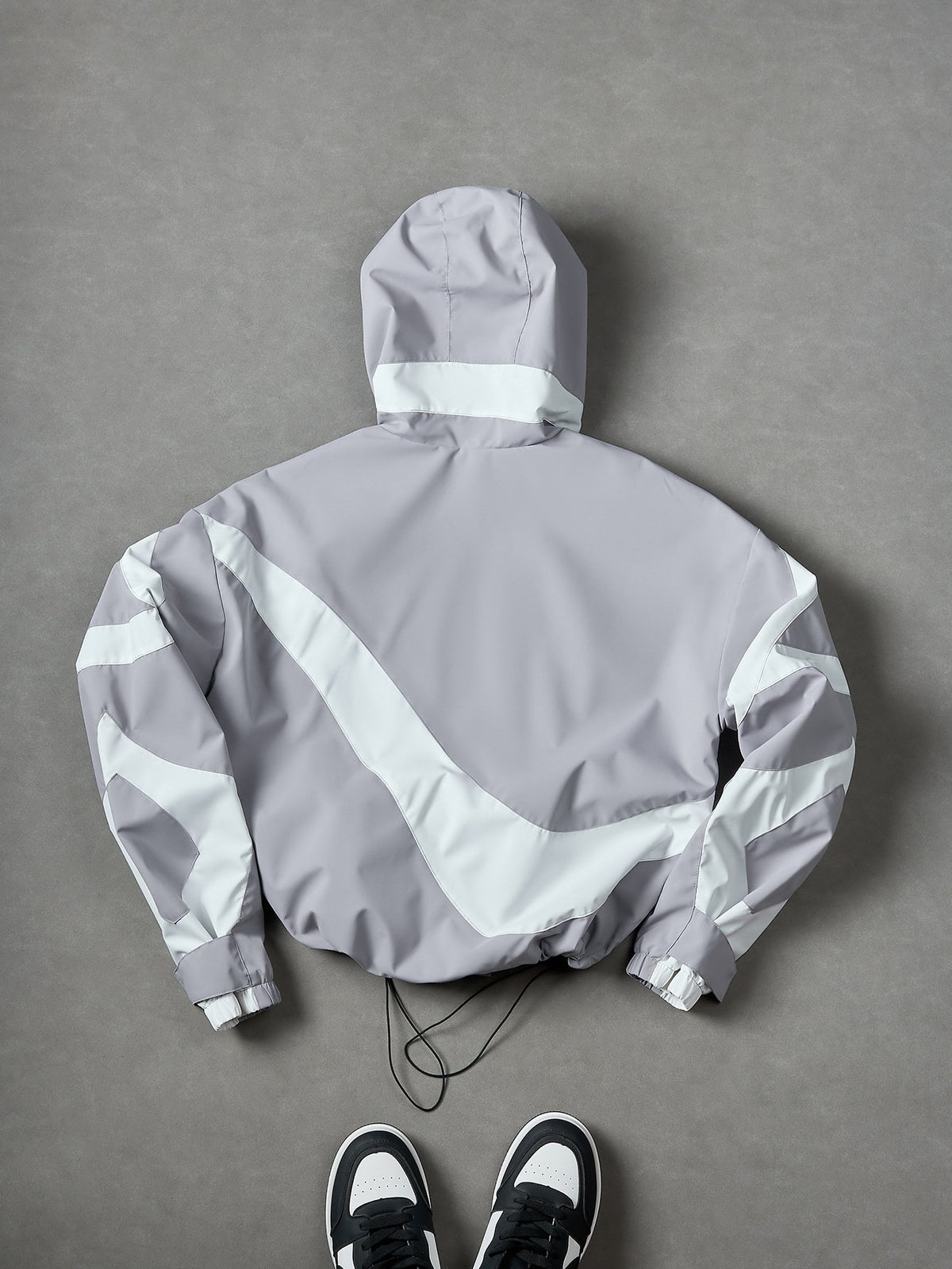 FluxGuard – Futuristic Urban Performance Windbreaker